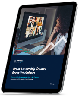 Tablet with the “Great Leadership Creates Great Workplaces” eBook cover on it.